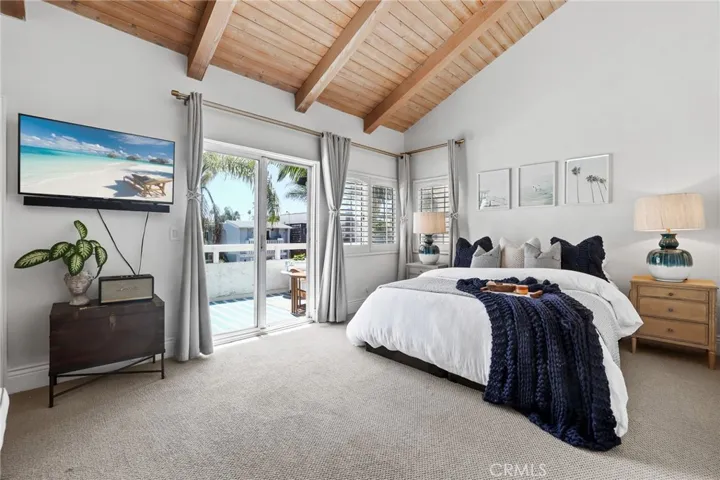 Front Primary suite with vaulted ceilings.