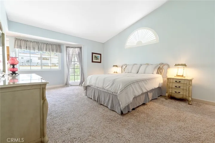 Primary Bedroom with Door to Backyard
