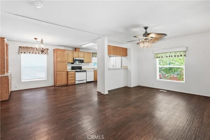 Living room, dining and kitchen area.