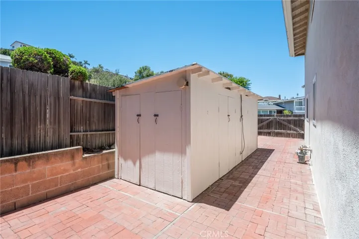 Storage shed on side yard