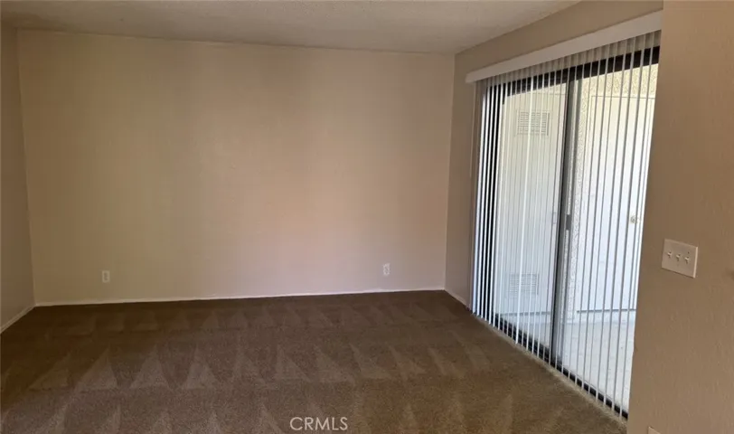 Living room with sliding door to balcony