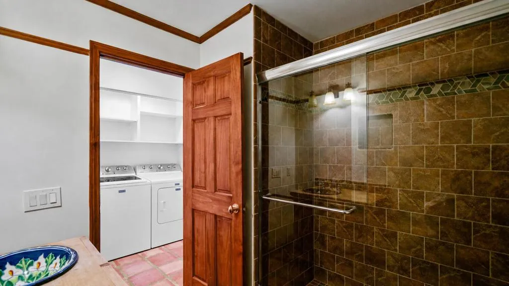 Guest bathroom across from laundry area