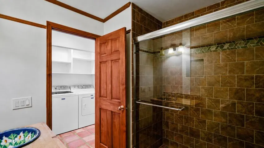 Guest bathroom across from laundry area
