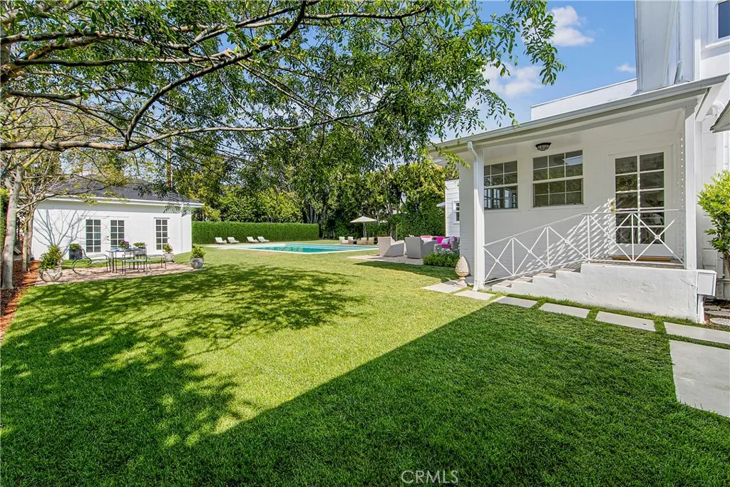 View of backyard and detached Guest House