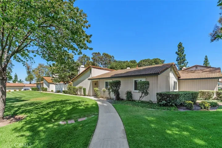 Single level living surrounded by lush trees and scenic greenbelt views.