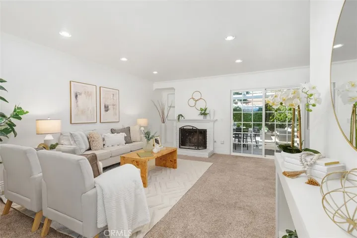 Bright, open living room with patio access.