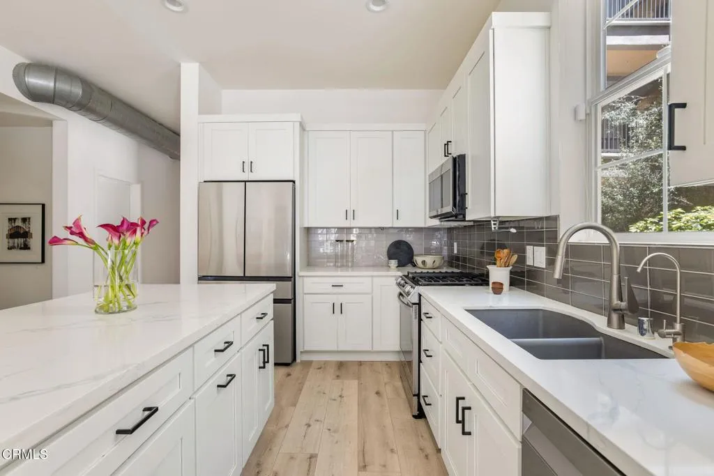 018_Pacific Promenade 13020 Unit 102_by