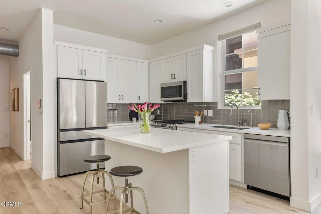 016_Pacific Promenade 13020 Unit 102_by