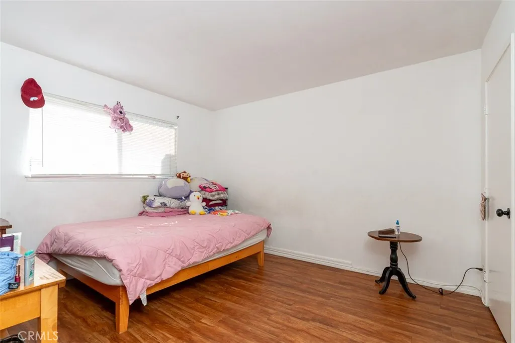 Spacious primary bedroom with plenty of room to unwind.