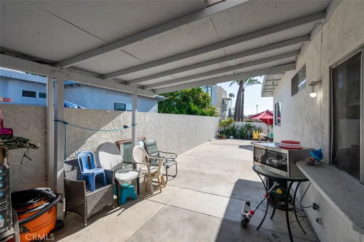 Private covered patio perfect for relaxing or outdoor dining.