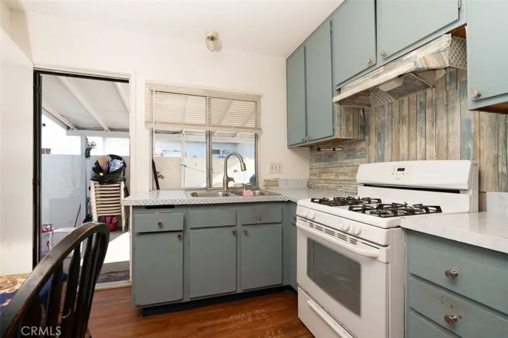 Functional kitchen featuring ample cabinetry and generous counter space.