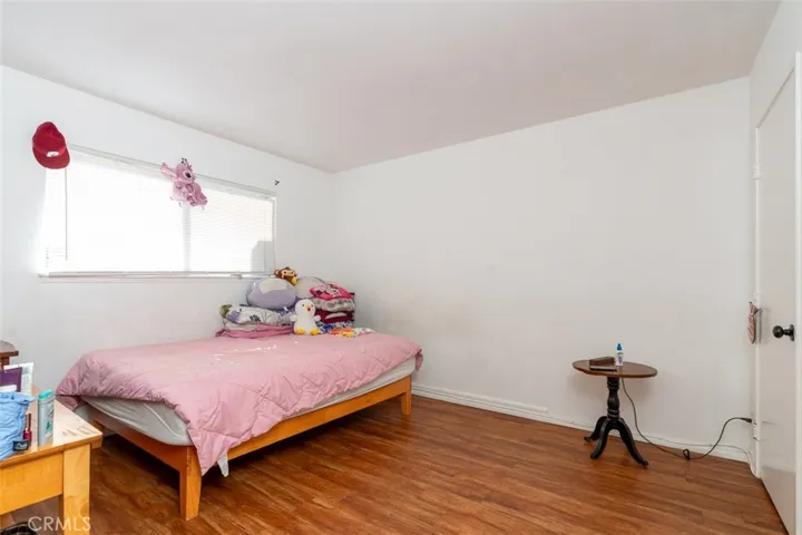 Spacious primary bedroom with plenty of room to unwind.