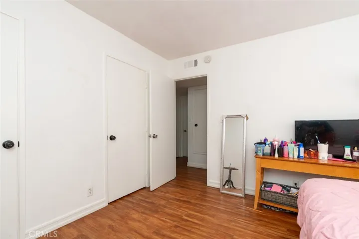 Spacious primary bedroom with plenty of room to unwind.
