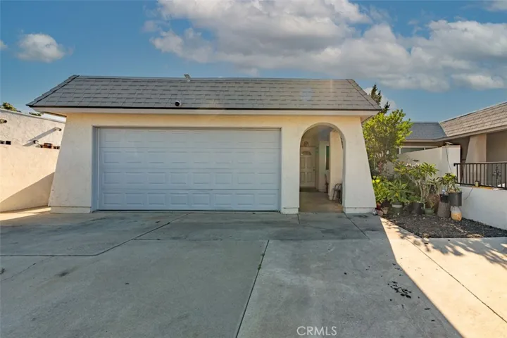 Attached two-car garage provides secure parking and extra storage.