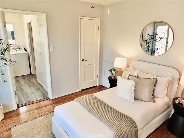 Another view of rear bedroom show where the closet is qnd that it leads into the laundry room.