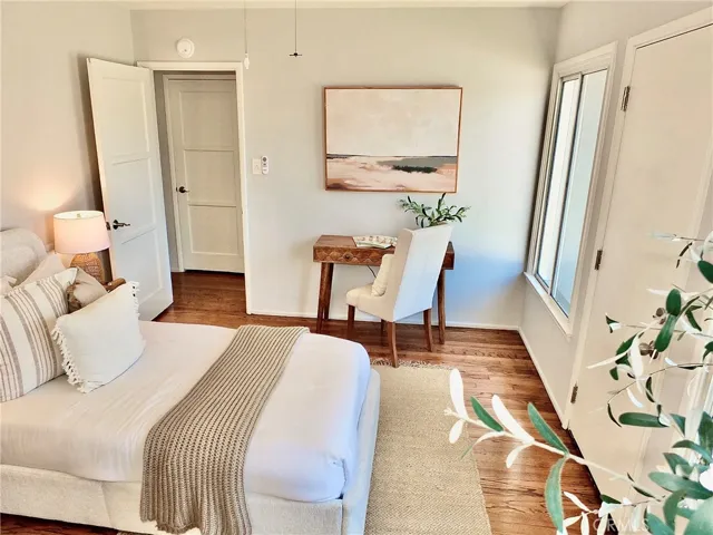 Versatile rear bedroom, perfect as a home office or guest bedroom which looks onto the hall closet.
