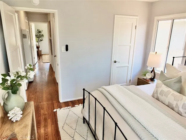 Rear bedroom showing the beautiful flooring that extends to the front bedroom.