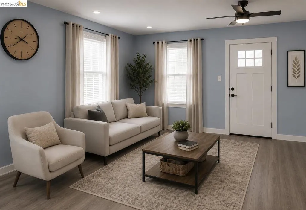 Living room featuring wood-finish flooring, two windows with blinds, a ceiling fan, recessed lighting, and a white paneled entry door with glass inserts
