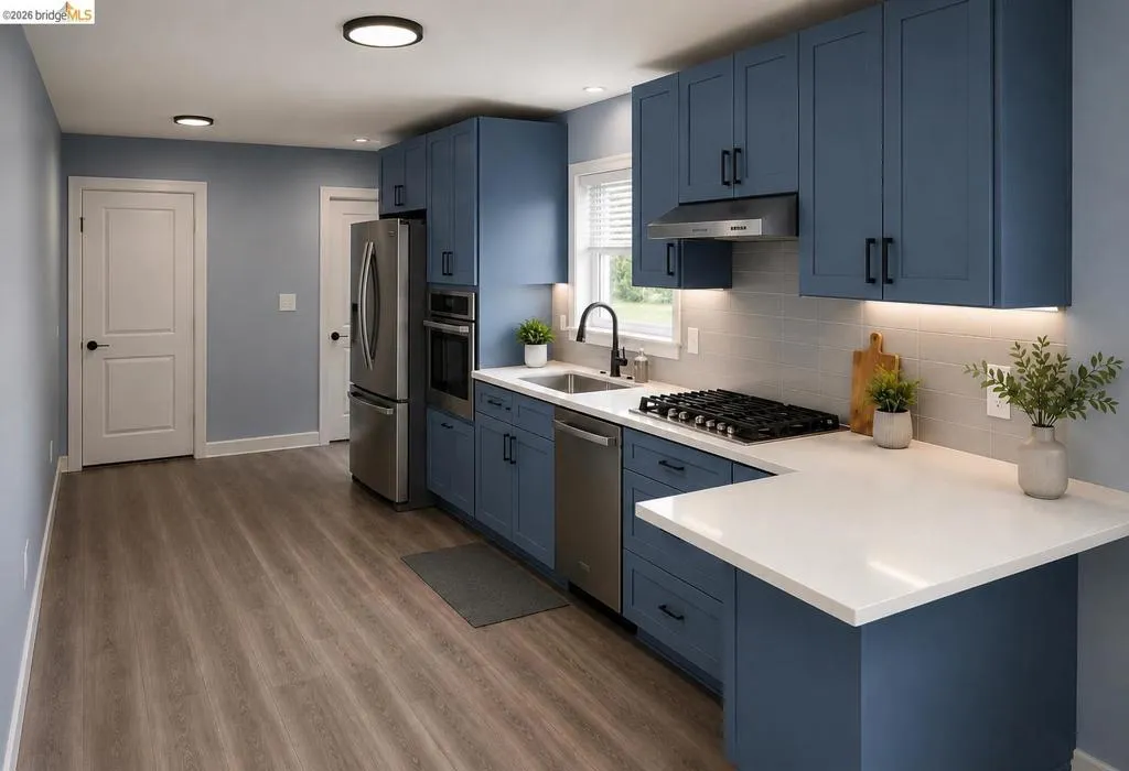 Modern kitchen featuring blue shaker cabinetry, light wood-finish flooring, stainless steel appliances, white countertops, and a subway tile backsplash