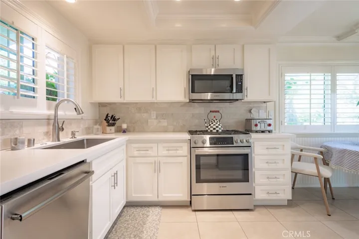 Update kitchen with Corian counters and Bosch appliances