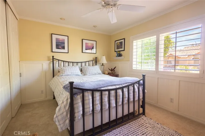 Secondary Bedroom with custom wainscot.