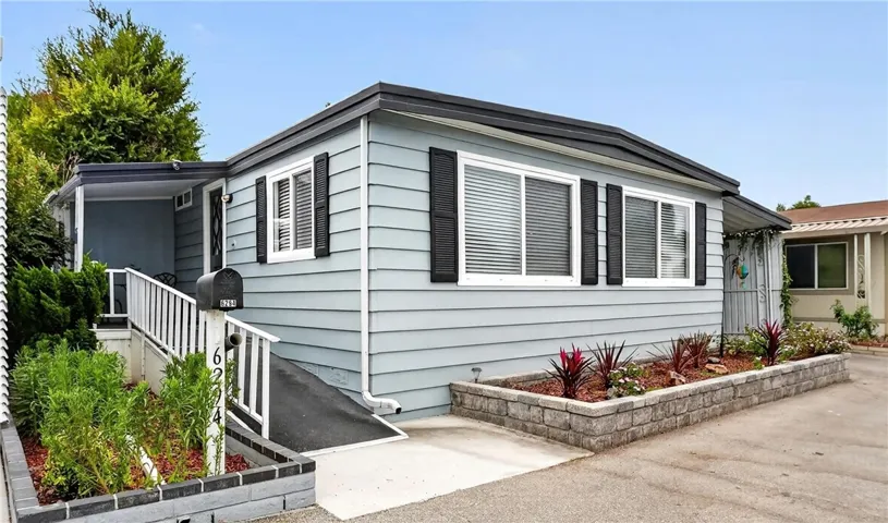 Welcome to your new home. This neighborhood is lovely with so many wonderful people to meet! As you can see, the front porch and front door is on the left of this home.