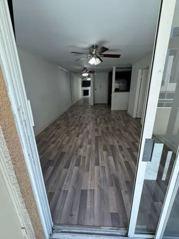 SPACIOUS, OPEN FLOOR PLAN OF LIVING ROOM