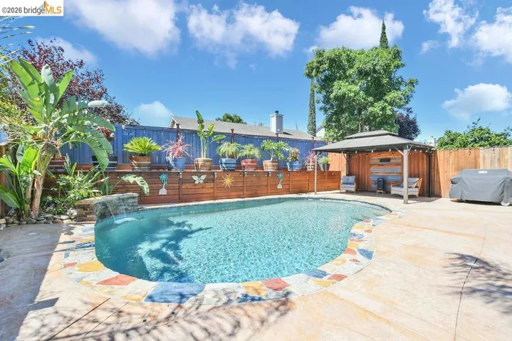 Relaxing In-Ground Pool with a Tranquil Waterfall!