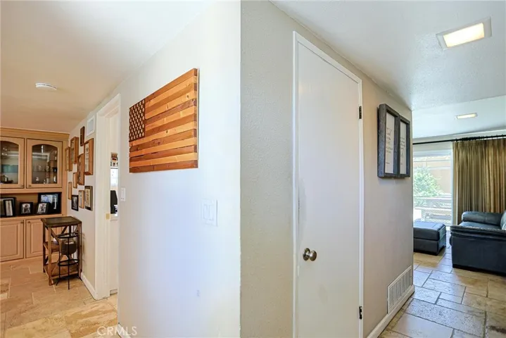 View from Front Entrance to Living and Family Room