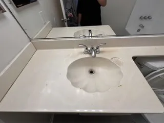 vanity in hallway bathroom