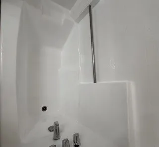 bathtub in hallway bathroom