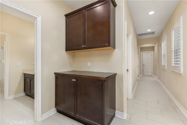 Storage and Hallway to Bedrooms