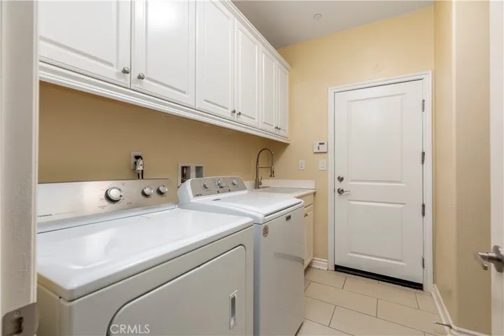 Separate Landry Room with New Washer and Dryer