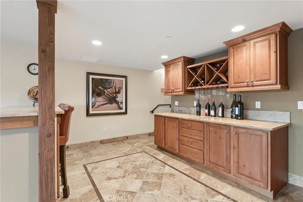 wood cabinets for storage in fitness room or game room