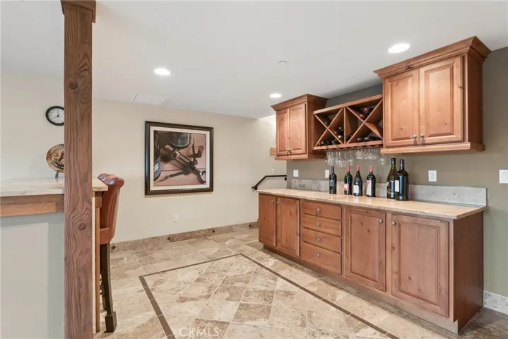 wood cabinets for storage in fitness room or game room