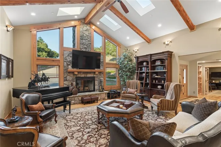 Cathedral high living room ceilings with fireplace
