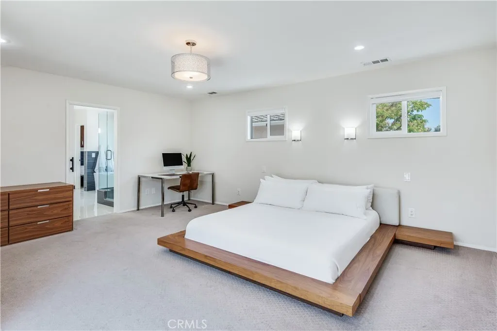Large primary with spacious en suite bathroom