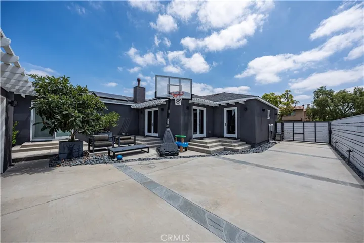 Long driveway with electronic gated entry.