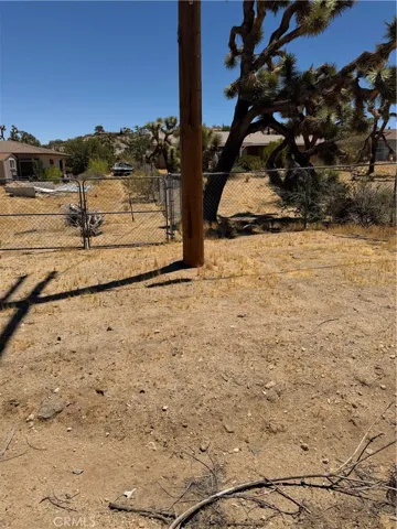 Electricity Power Pole located at or near the Back Right Corner of the Lot. Check with the City/County for availability and access.