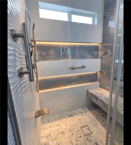 Shower with custom built bench.
