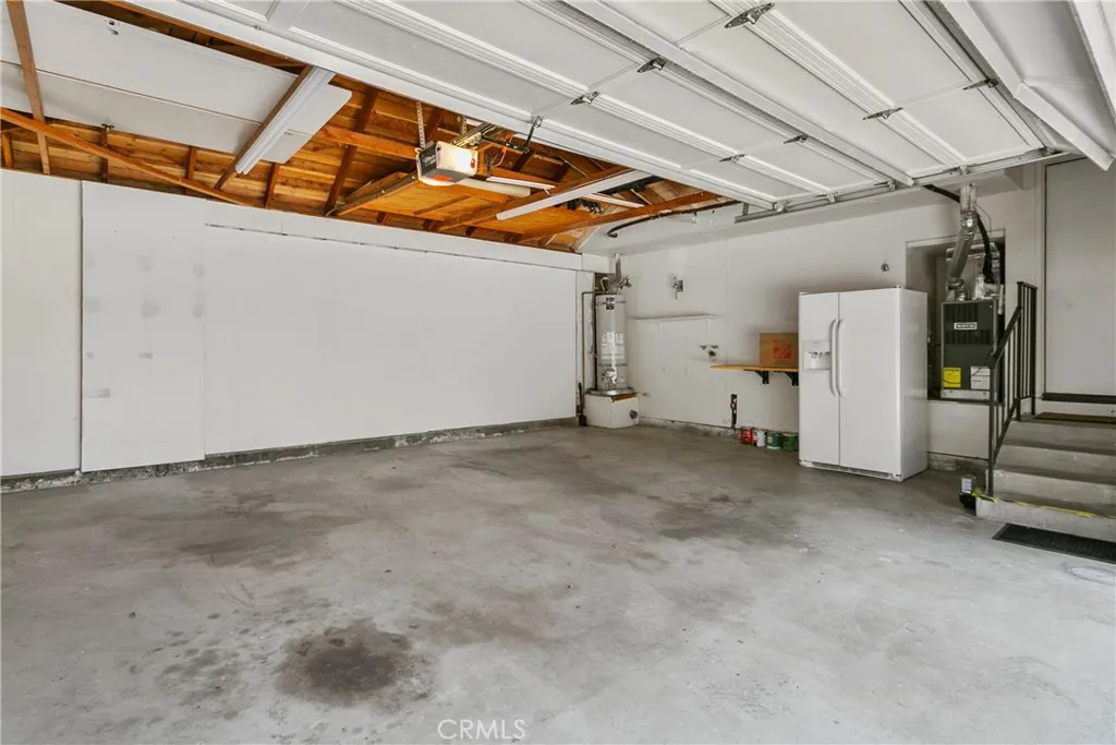 2 car garage (includes 2nd fridge in garage). Laundry hook-ups to right of water heater.