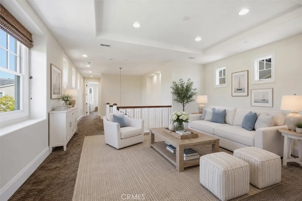 Upstairs loft Bonus are digitally altered and staged to show decorating potential