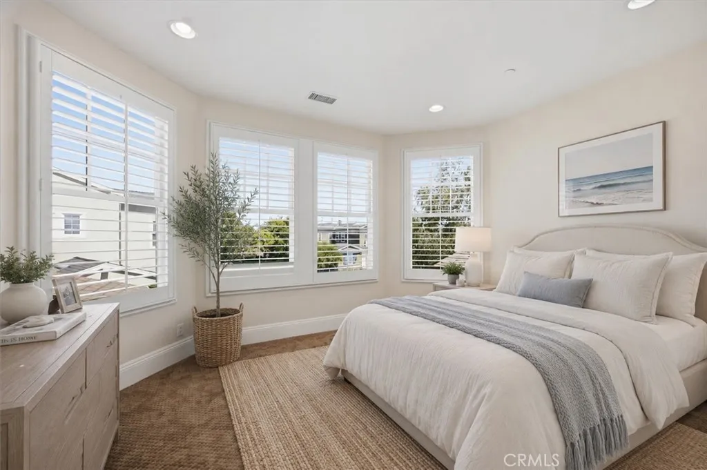 Upstairs front bedroom digitally altered and staged to show decorating potential