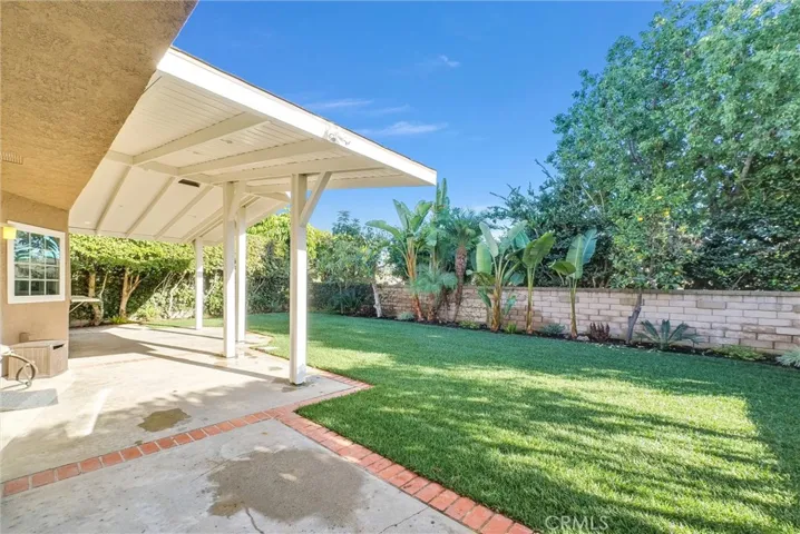 Spacious backyard perfect for entertaining and pets.