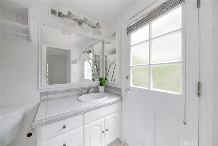 bathroom attached to primary bedroom