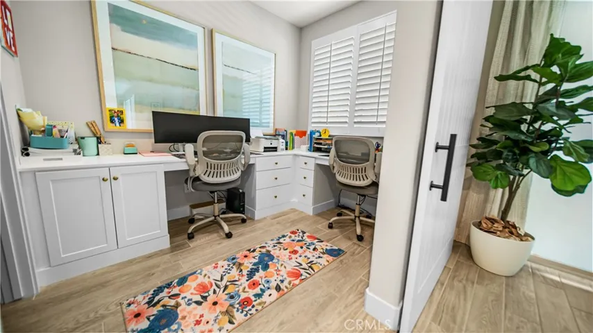 office/tech space with built in desks