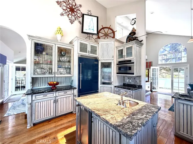 Kitchen is open with high ceilings