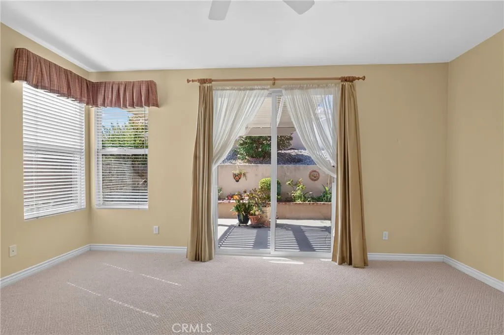 Looking out the sliding door in the primary bedroom