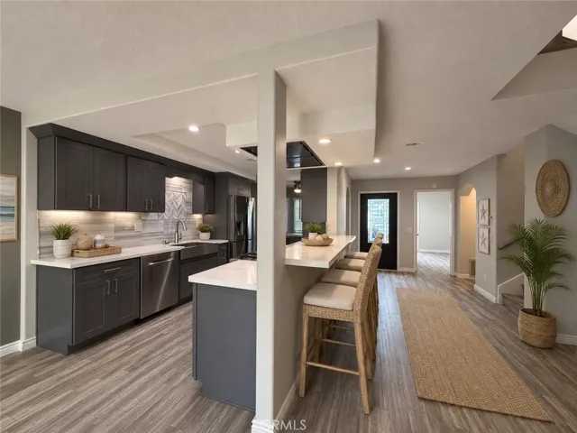 looking toward the front door entry way-  Digitally staged photo