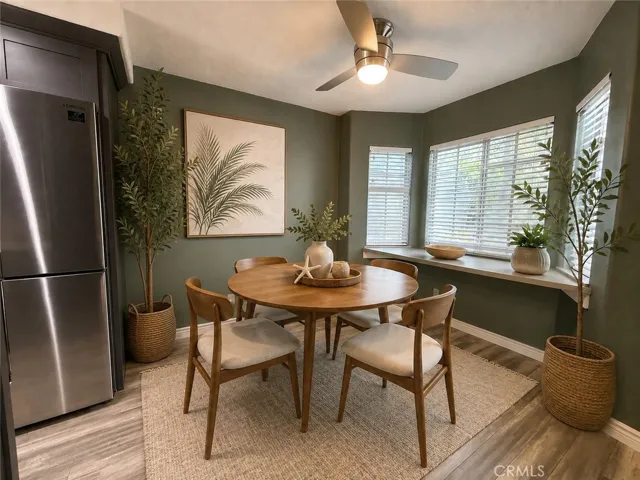 Front eating nook. Would make a nice home office as well.  Digitally staged photo